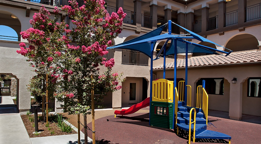 Verano apartments outdoor play equipment area
