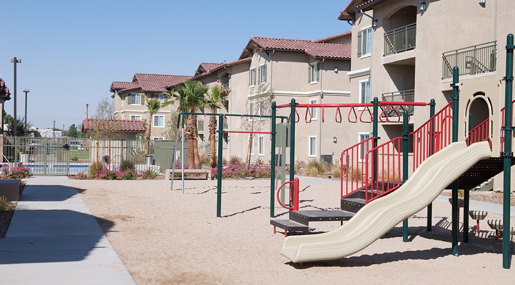 Valle del Sol apartments buildings and playground